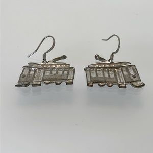 Maurice Milleur streetcar earrings. Vintage item from 1993.
